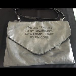 Grey and black clutch/crossover bag with strap